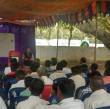 Deepti U., PhD student at IISc, presenting ATCHA outcomes to farmers in the premises of Puttanapura primary school